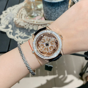 2023 New Ladies Watch Snowflake Hollow out See through Fashion Rotating Rhinestone Light Luxury Women's Watch 77023