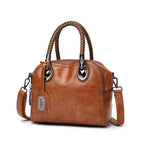 2021 new women's bag oil wax leather hit color portable single-shoulder messenger retro fashion hinged children's bag 231