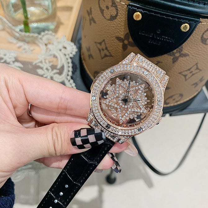 full diamond inlaid diamond rotary dial belt women's watch hollow transparent fashion women's watch feminine temperament five star