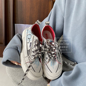Personality graffiti canvas shoes men and women couple shoes 2021 new simple hand-painted shoes breathable low-top flat bottom shoes