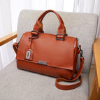 2021 new European and American style flip leather portable messenger pillow Boston large capacity female bag 230