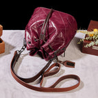 2021 new retro fashion one-shoulder messenger large-capacity cable mouth embroidered lattice bucket female bag 255