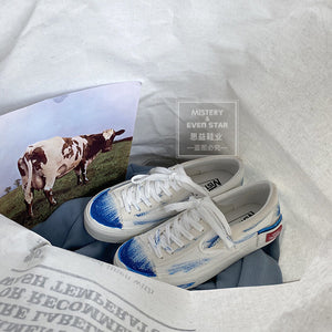 Classic all-match low-cut one-step girl white shoes 2021 fall new cute graffiti canvas shoes 539