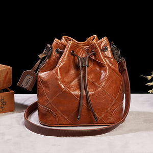 2021 new retro fashion one-shoulder messenger large-capacity cable mouth embroidered lattice bucket female bag 255
