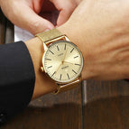 WWOOR Men Simple Slim Quartz Watch Gold Steel Mesh Ultra Thin Men Watches Luxury Brand Waterproof Male Wrist Watch Golden Clock